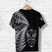 Black T-shirt back print with silver fern feathers and Maori mask design
