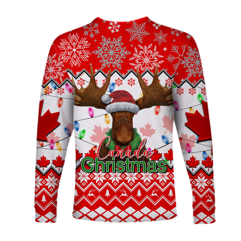 Red long-sleeve moose Christmas shirt with Canada text, maple leaves and ornaments