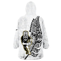 White wearable blanket hoodie back with Aroha text and Maori warrior print