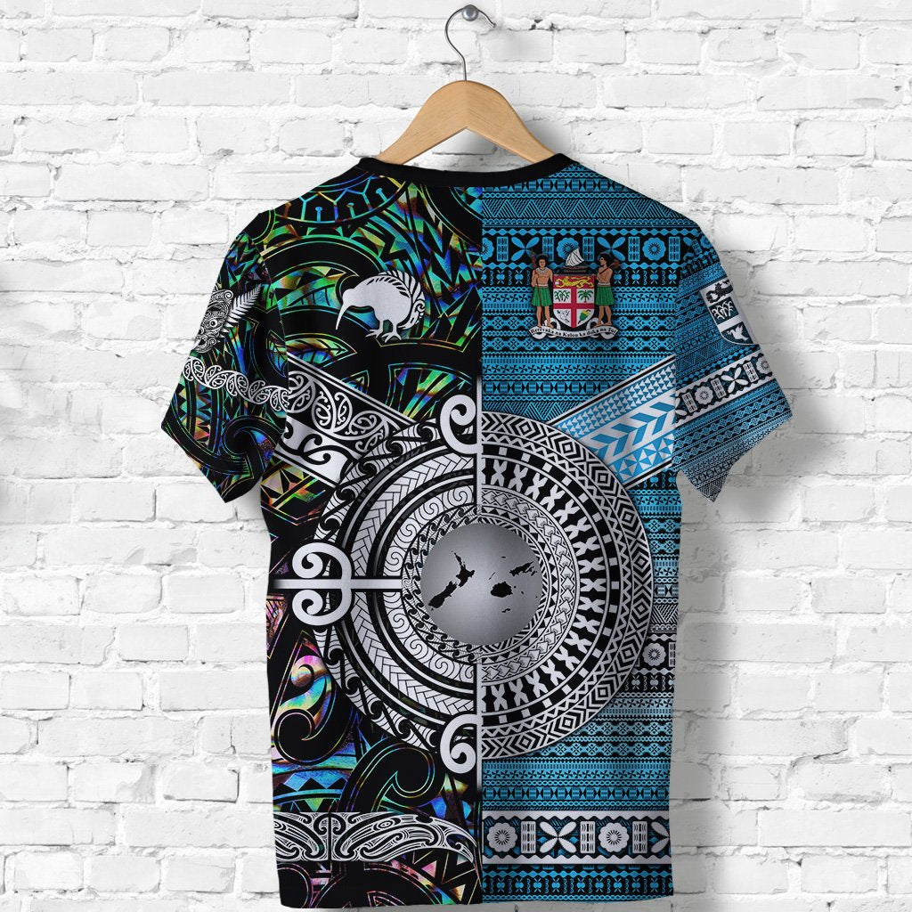 Back view of blue crew-neck T-shirt with circular tribal pattern and island graphics