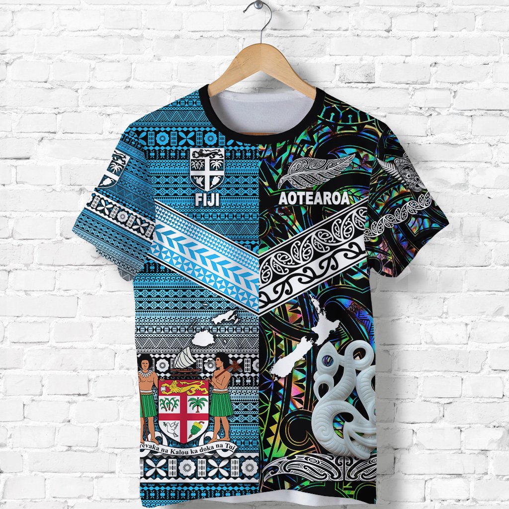 Blue graphic crew-neck T-shirt with FIJI and AOTEAROA text, tribal patterns, short sleeves