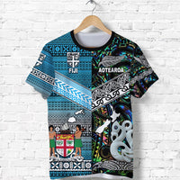 Blue graphic crew-neck T-shirt with FIJI and AOTEAROA text, tribal patterns, short sleeves