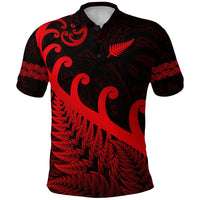 Red and black Maori-style polo shirt with fern and koru motif, short sleeves