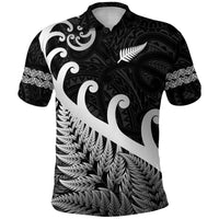 Black polo shirt with large white koru-style fern print and Maori pattern sleeves