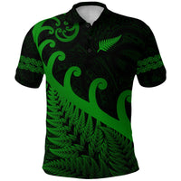 Green and black Maori-style polo shirt with fern and koru graphic, short sleeves