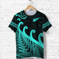 Dark T-shirt with turquoise fern and koru tribal print, short sleeves front view