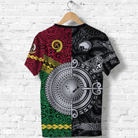 Back view black T-shirt with Vanuatu and Aotearoa motifs and circular emblem graphic