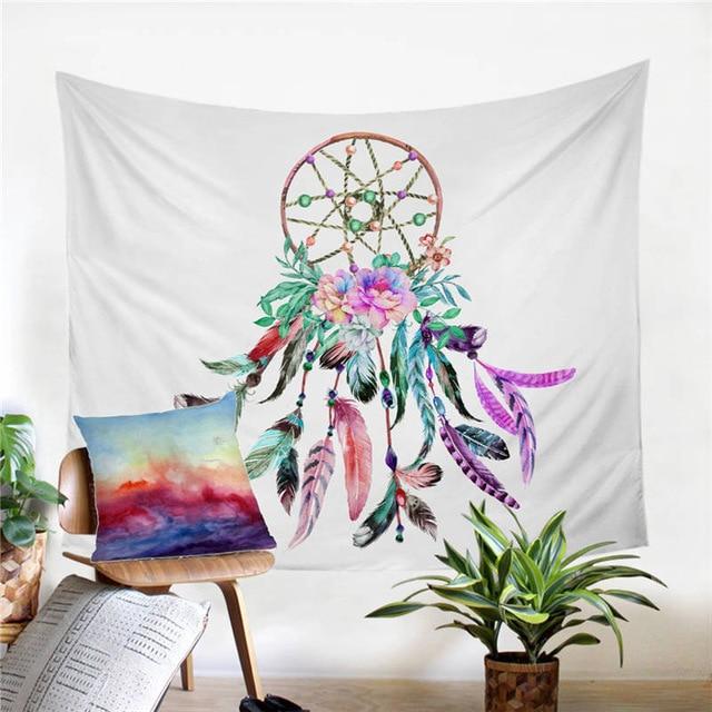 Purple and pink dreamcatcher tapestry with flowers, green leaves, and long feather strands.