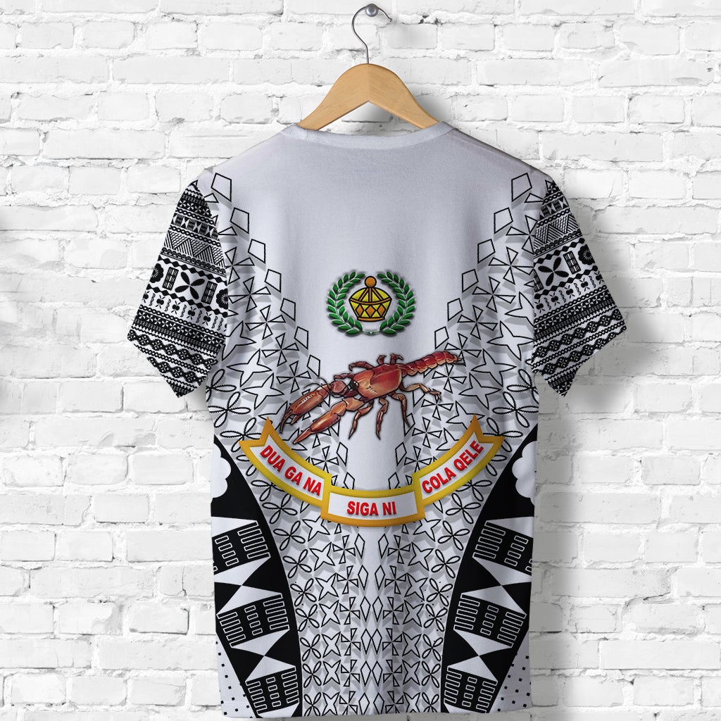 White rugby T-shirt back view with green emblem, black geometric blocks, and ribbon text