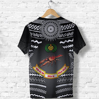 Black rugby T-shirt back, circular mandala emblem, crab graphic, yellow badge bands