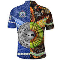 Blue polo back with earth circle and Aboriginal dot-pattern graphic