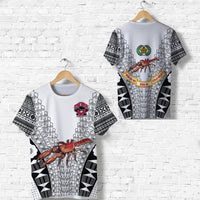 White Fiji Rewa rugby T-shirt with black geometric print, crab graphic, and red crest