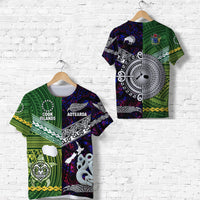 Maori-inspired T-shirt in purple and green with bold tribal map-style graphic print