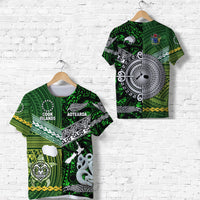 Green T-shirt with Cook Islands & Aotearoa tribal graphic and white round emblem