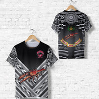Black rugby T-shirt pair: front crest and v-striped tribal crab print; back tribal circle