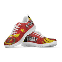 Tigray patterned sneakers, red/yellow star and coat-of-arms graphic, white sole