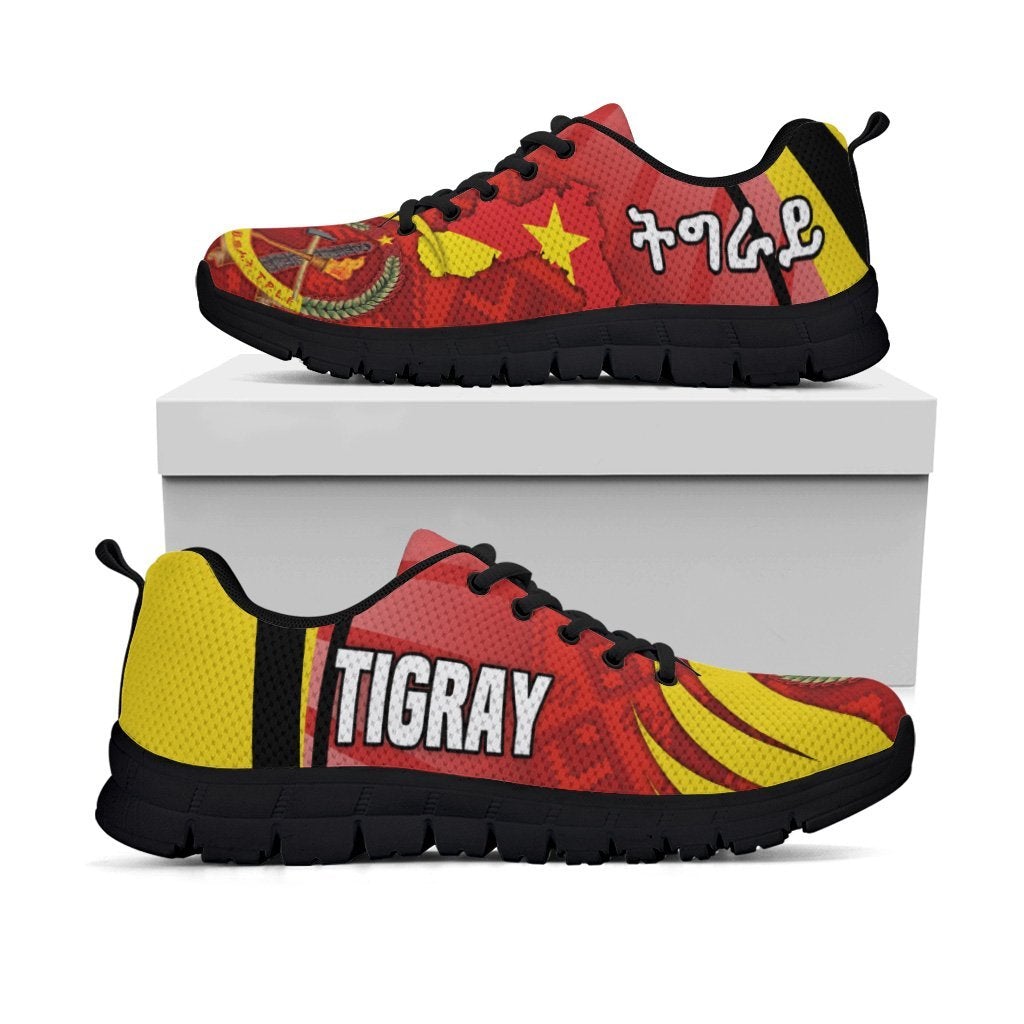 Tigray sneakers, red/yellow Africa pattern with stars and coat-of-arms, black sole on box