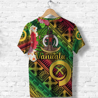 Green Vanuatu T-shirt with bold 'Vanuatu' script, tribal graphics, circular emblem