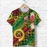 Green Vanuatu T-shirt with multicolor tribal pattern, 'Vanuatu' text, flowers and emblem