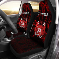 Installed Tonga pattern car seat covers in red and black, full seat and headrest