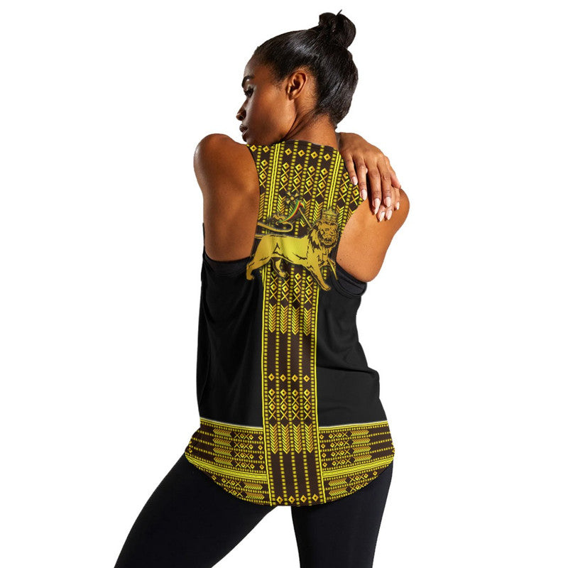 Back view: black racerback tank with yellow-green vertical pattern panel